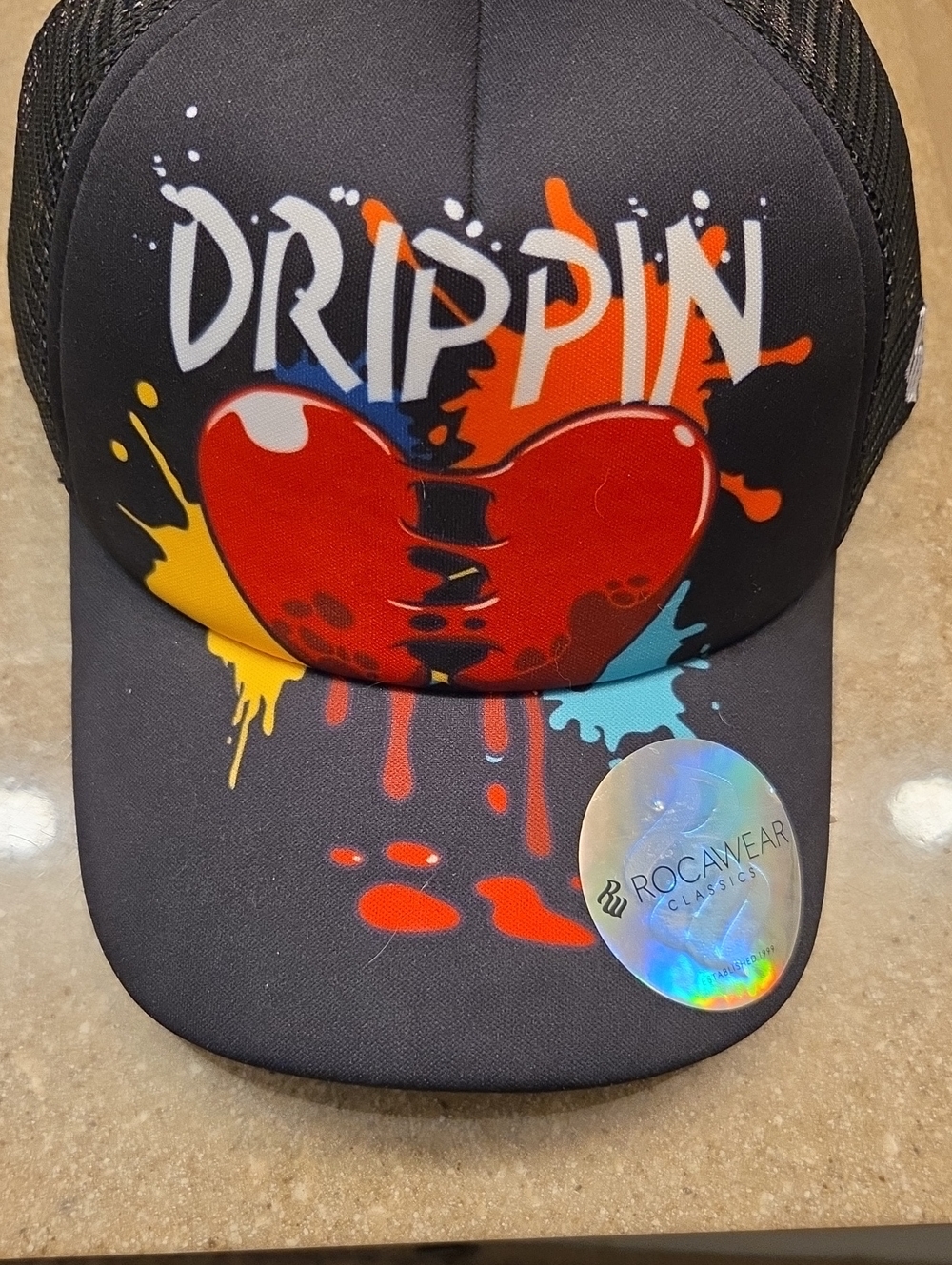 Rocawear Kids Black Trucker Hat with Red Heart and Multicolor Paint Splashes